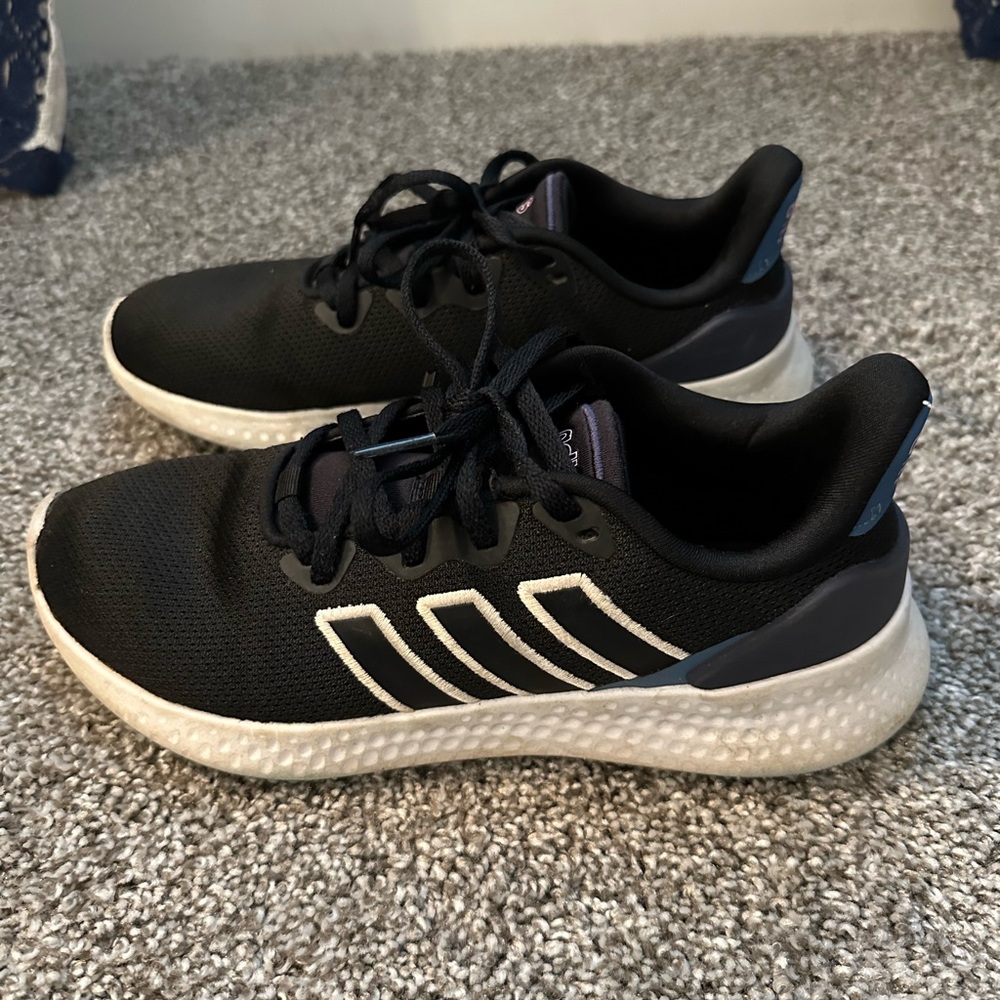 Black and white Adidas sneakers. Women’s size 6.